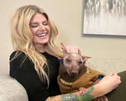 Her dog often appears in her Instagram posts.